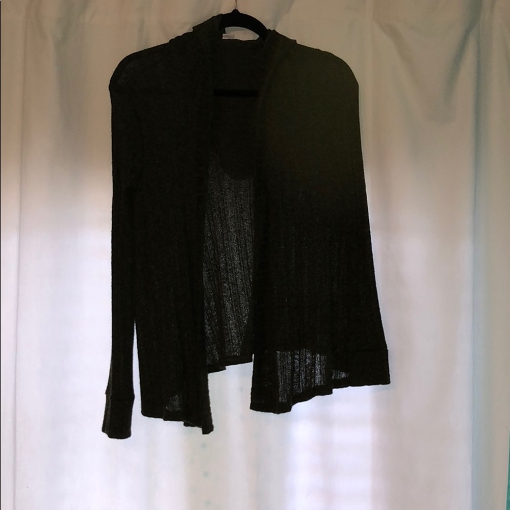 A dark green, knitted cardigan